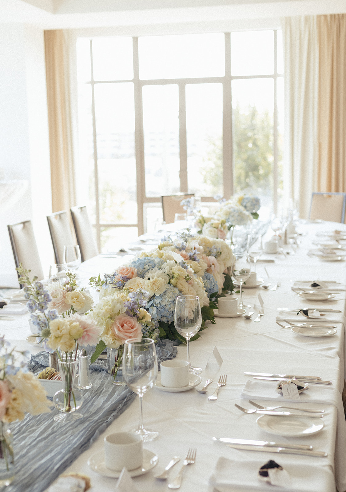 Reception table runner of blush and blue florals